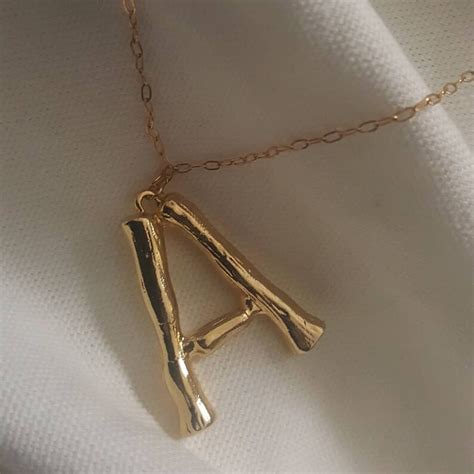 where to buy celine initial necklace|celine bracelet for women.